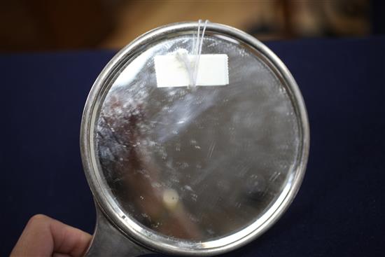 An early 20th century Chinese silver hand mirror, 10.25 in.